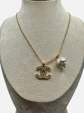CHANEL Gold-Tone Crystal CC Logo Necklace with Pearl Charm